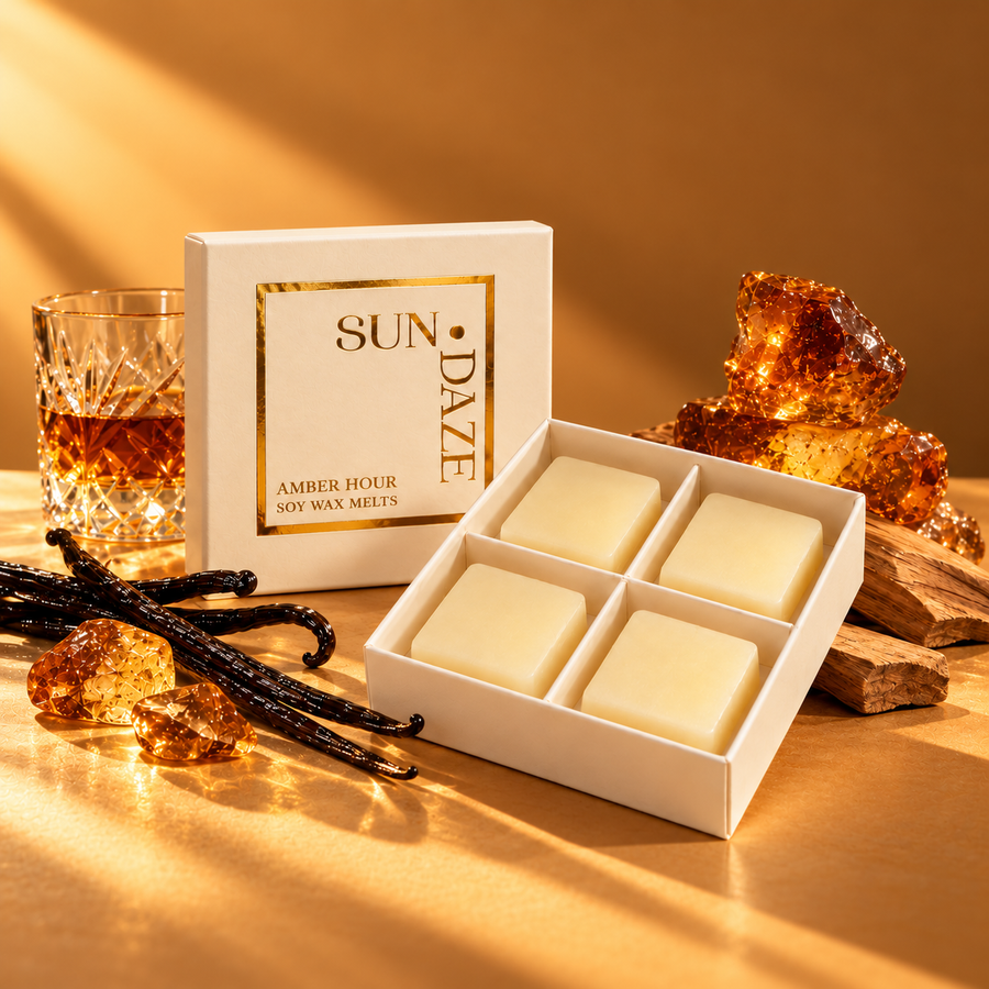 SUNDAZE AMBER HOUR soy wax melts in an open four-piece box with scent-inspired props