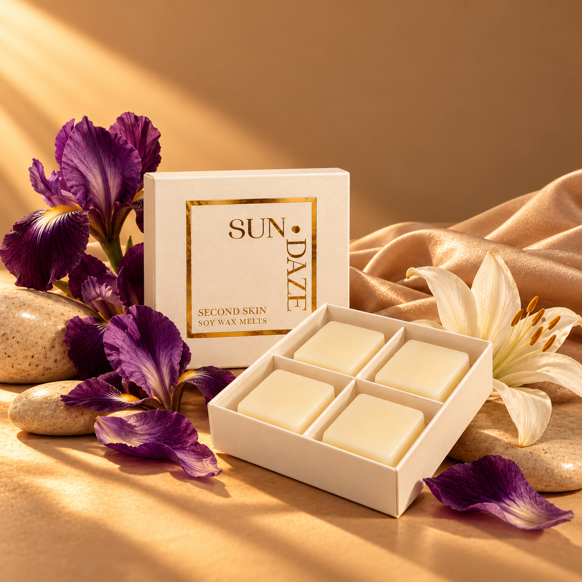 SUNDAZE SECOND SKIN soy wax melts in an open four-piece box with scent-inspired props